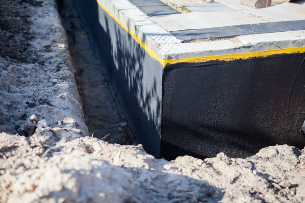 Professional Waterproofing technician working in Crestline, OH